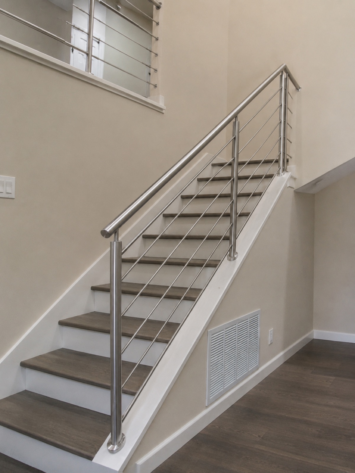 Custom stainless steel interior stair railing in an East Bay home