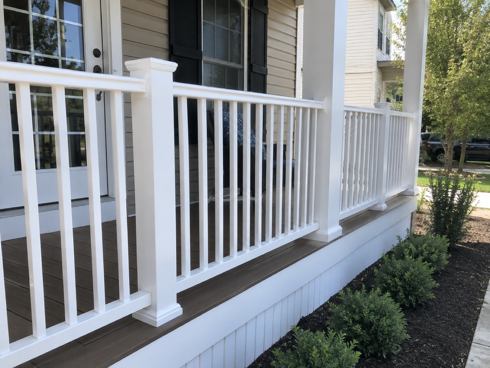 White powder-coated deck railing on an East Bay porch
